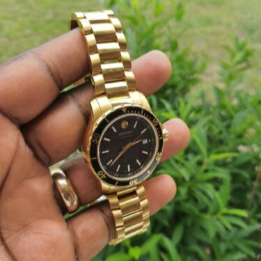  Shop Authentic Movado Series 800 Black Dial Gold Steel Strap Watch For Men - 2600145 - Luxxuri
