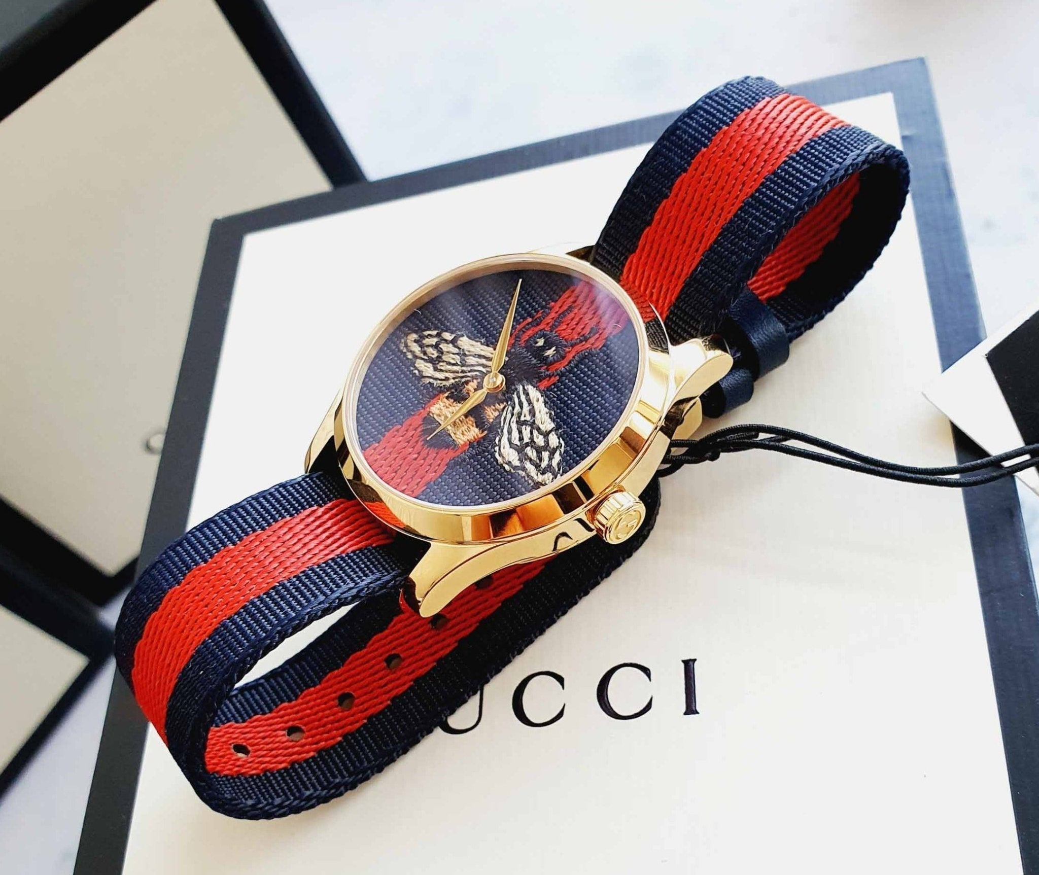  Shop Authentic Gucci G Timeless Bee Red & Blue Dial Red Two Tone Nylon Strap Watch For Men - YA1264061 - Luxxuri