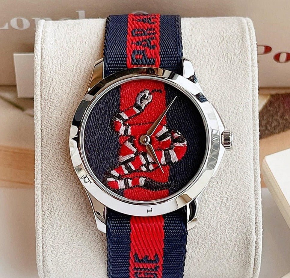  Shop Authentic Gucci Le Marche Des Merveilles Blue Red Dial Blue Red Nylon Strap Unisex Watch - YA126493 - Luxxuri