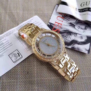  Shop Authentic Guess Analog Diamonds Silver Dial Gold Steel Strap Watch For Women - W1013l2 - Luxxuri
