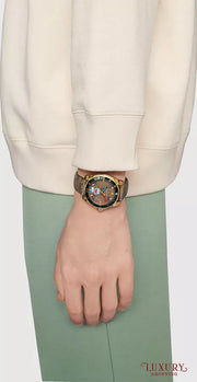  Shop Authentic Gucci Dive Doraemon Quartz Brown Dial Brown Leather Strap Watch For Men - YA136335 - Luxxuri