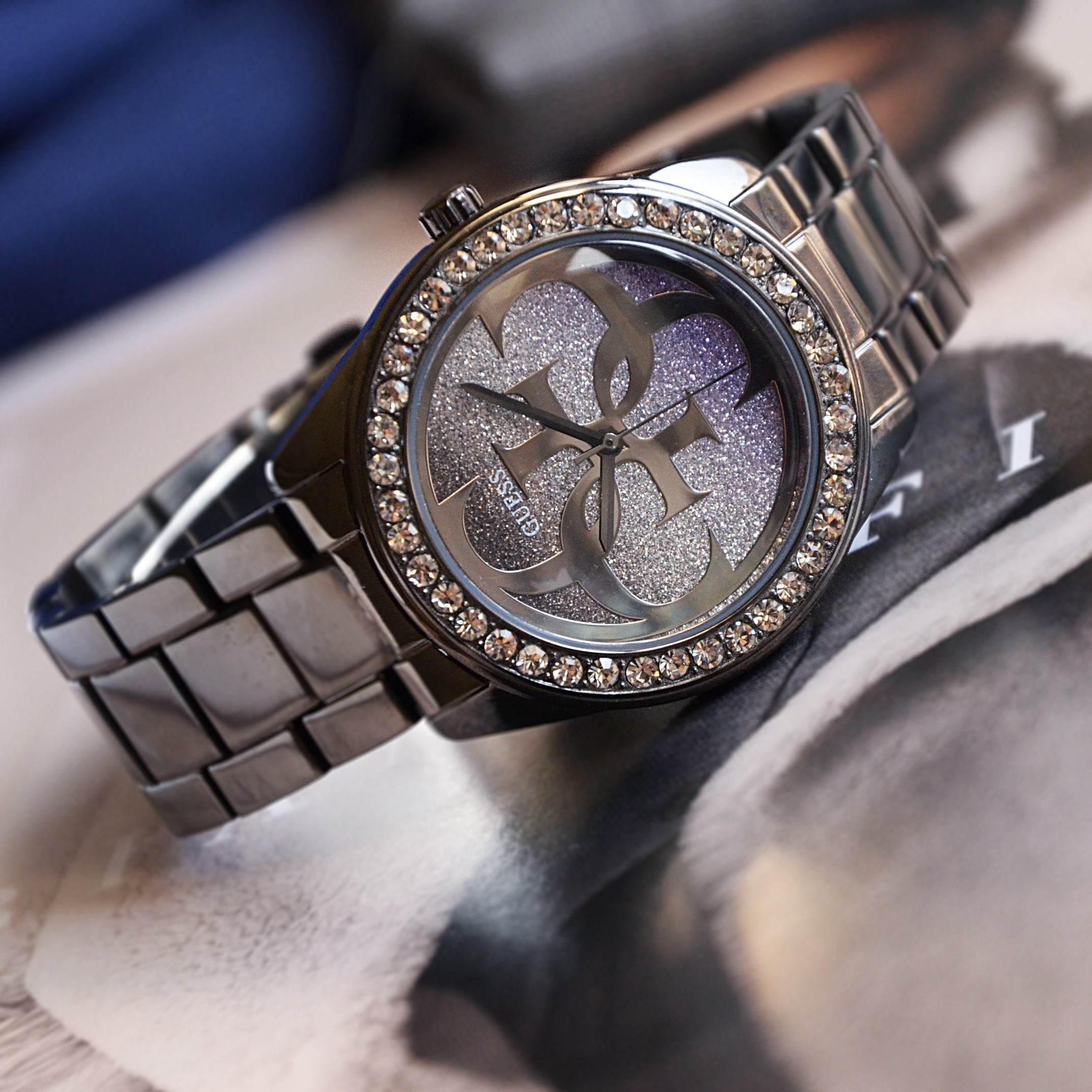  Shop Authentic Guess G Twist Diamonds Purple Dial Black Steel Strap Watch For Women - W1201L4 - Luxxuri
