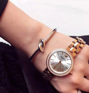  Shop Authentic Swarovski Daytime Analog Gold Dial Gold Steel Strap Watch for Women - 5182231 - Luxxuri