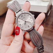  Shop Authentic Guess Chiffon Silver Dial Silver Mesh Bracelet Watch For Women - W1083L1 - Luxxuri
