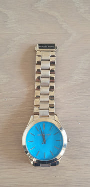  Shop Authentic Michael Kors Slim Runway Blue Mother of Pearl Dial Gold Steel Strap Watch for Women - MK3492 - Luxxuri