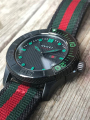  Shop Authentic Gucci G Timeless Sport Black Dial Two Tone NATO Strap Watch For Men - YA126229 - Luxxuri