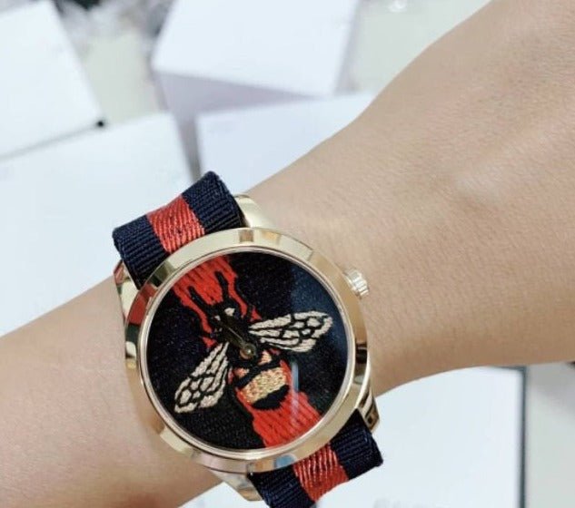  Shop Authentic Gucci G Timeless Bee Red & Blue Dial Red Two Tone Nylon Strap Watch For Men - YA1264061 - Luxxuri