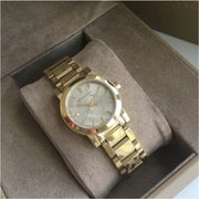  Shop Authentic Burberry The City Gold Dial Gold Steel Strap Watch for Women - BU9234 - Luxxuri
