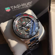  Shop Authentic Tag Heuer Formula 1 Chronograph Indy 500 Special Edition Grey Dial Silver Steel Strap Watch for Men - CAZ1016.EB0058 - Luxxuri