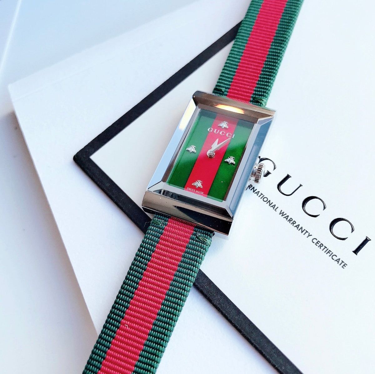  Shop Authentic Gucci G-Frame Mother of Pearl Dial Two Tone Nylon Strap Watch For Women - YA147404 - Luxxuri