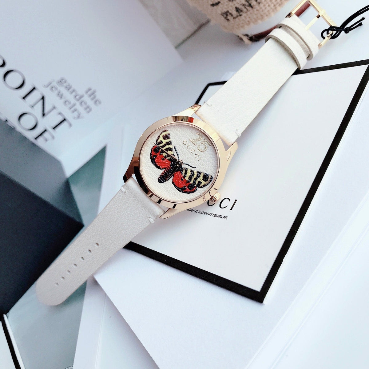  Shop Authentic Gucci G Timeless Butterfly White Dial White Leather Strap Watch For Women - YA1264062 - Luxxuri
