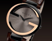  Shop Authentic Gucci Interlocking G 18K Gold Black Dial Brown Leather Strap Watch For Women - YA133304 - Luxxuri