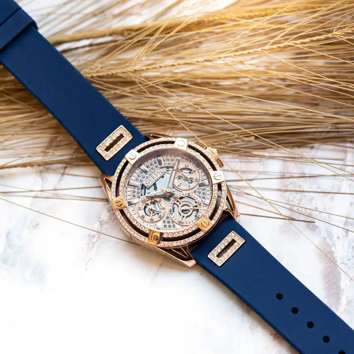  Shop Authentic Guess Queen Quartz Crystals Rose Gold Dial Blue Silicone Strap Watch For Women - GW0536L5 - Luxxuri
