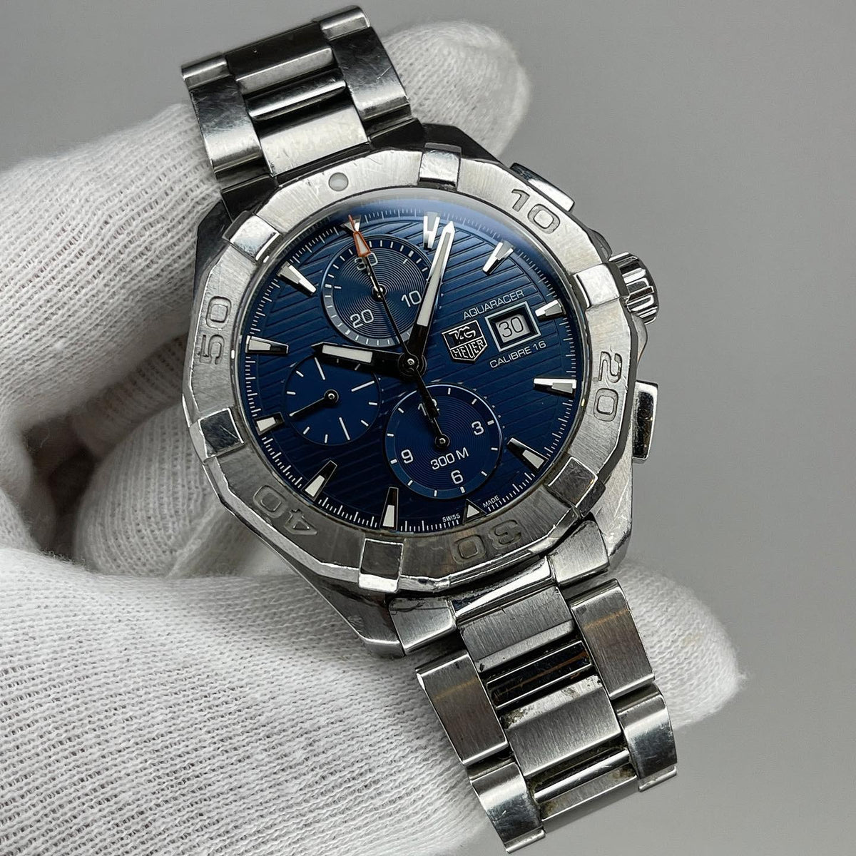  Shop Authentic Tag Heuer Aquaracer Caliber 16 Automatic Chronograph Blue Dial Silver Steel Strap Watch for Men - CAY2112.BA0927 - Luxxuri