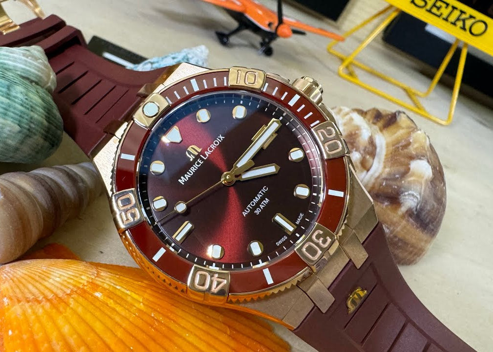  Shop Authentic Maurice Lacroix Aikon Venturer Asia Special Edition Red Dial Red Rubber Strap Watch For Men - AI6058-BRZ6B-530-6 - Luxxuri
