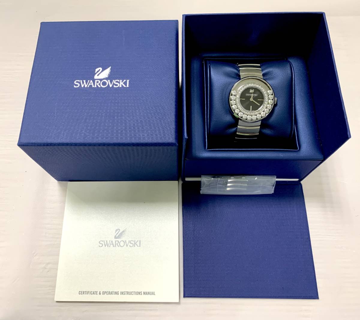  Shop Authentic Swarovski Lovely Crystal Black Dial Silver Steel Strap Watch for Women - 1160305 - Luxxuri