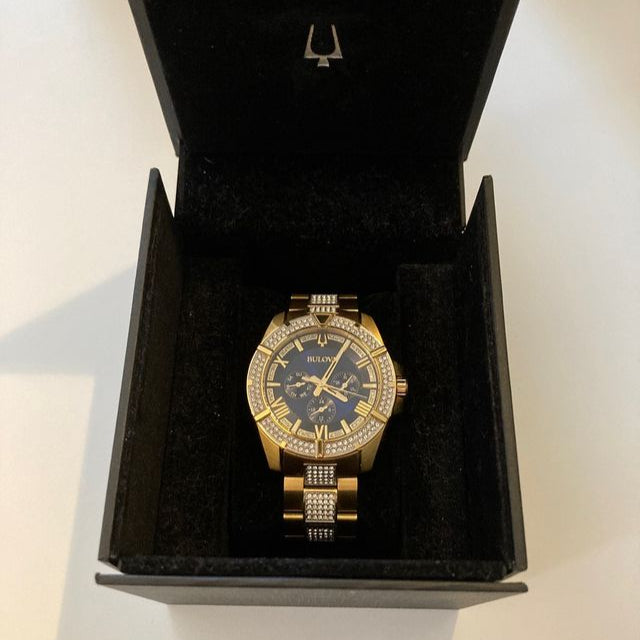  Shop Authentic Bulova Crystal Collection Blue Dial Gold Steel Strap Watch for Men - 98C128 - Luxxuri