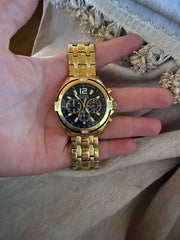  Shop Authentic Guess Surge Chronograph Black Dial Gold Steel Strap Watch for Men - W1258G2 - Luxxuri