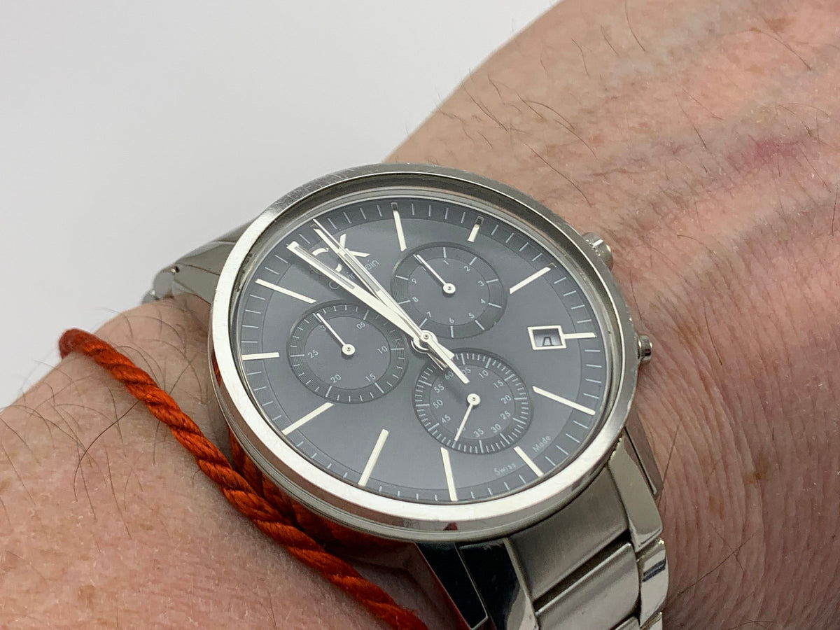  Shop Authentic Calvin Klein Post Minimal Chronograph Black Dial Silver Steel Strap Watch for Men - K7627161 - Luxxuri