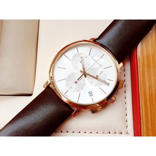  Shop Authentic Calvin Klein Posh Chronograph White Dial Brown Leather Strap Watch for Men - K8Q376G6 - Luxxuri