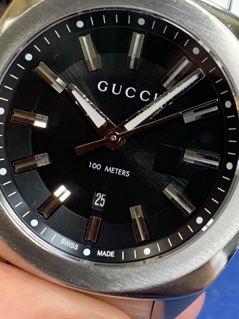  Shop Authentic Gucci GG2570 Quartz Black Dial Silver Steel Strap Watch For Men - YA142401 - Luxxuri