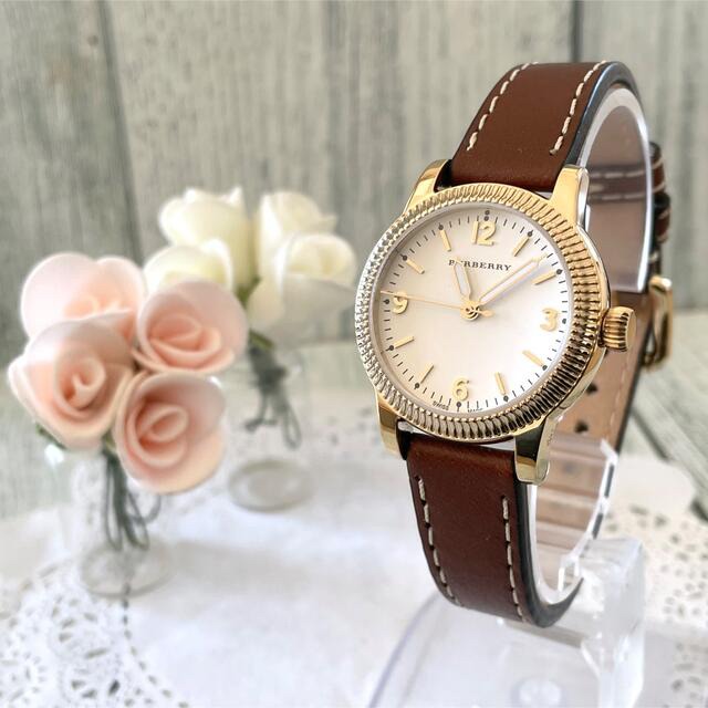  Shop Authentic Burberry The Utilitarian White Dial Brown Leather Strap Watch for Women - BU7865 - Luxxuri