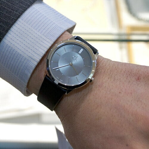  Shop Authentic Calvin Klein Minimal Grey Dial Black Leather Strap Watch for Men - K3M221C4 - Luxxuri