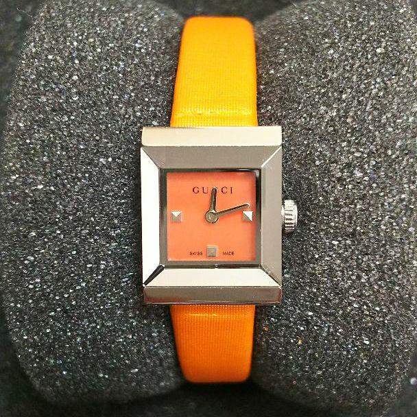  Shop Authentic Gucci G-Frame Square Mother of Pearl Orange Dial Orange Leather Strap Watch For Women - YA128532 - Luxxuri