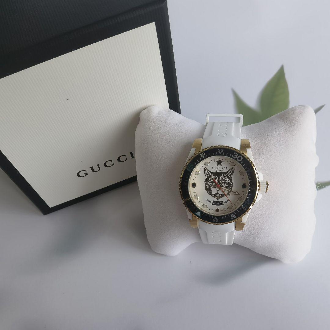  Shop Authentic Gucci Dive Quartz White Dial White Rubber Strap Unisex Watch - YA136322 - Luxxuri