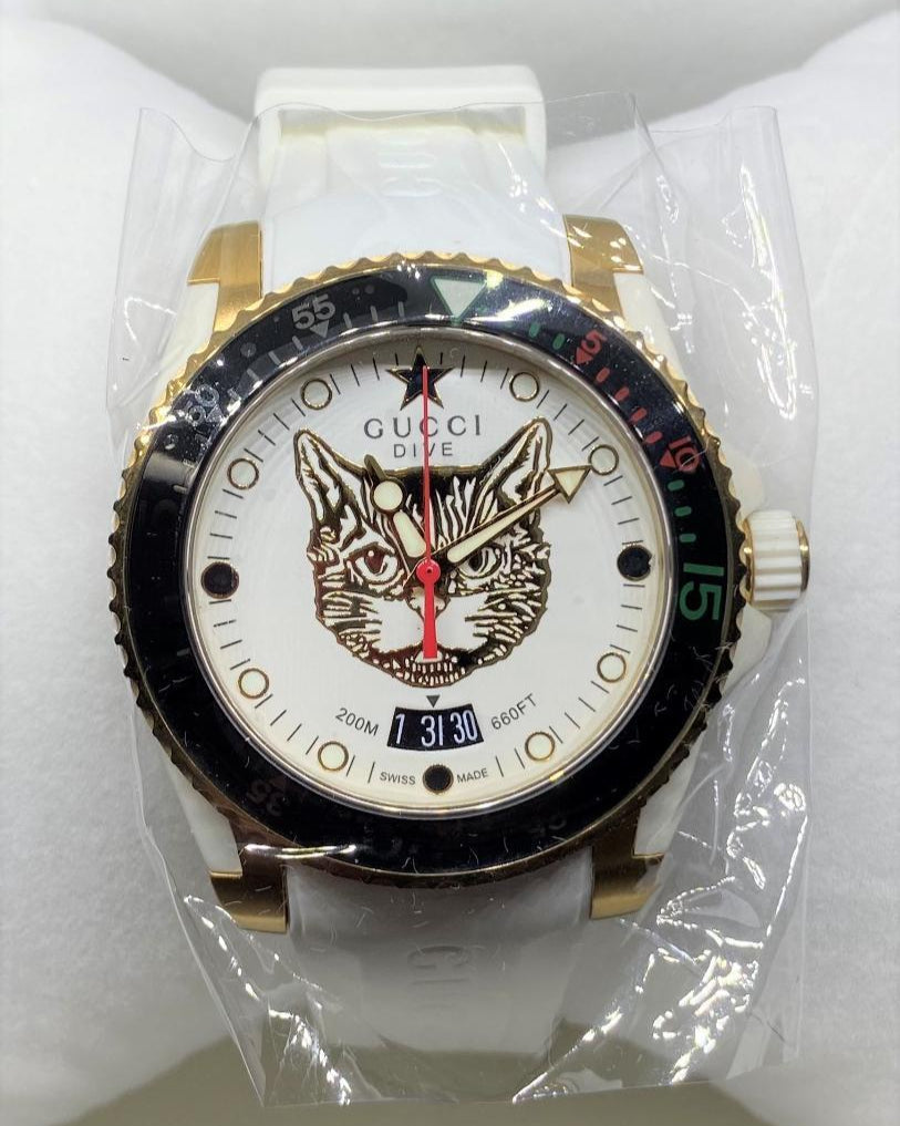  Shop Authentic Gucci Dive Quartz White Dial White Rubber Strap Unisex Watch - YA136322 - Luxxuri