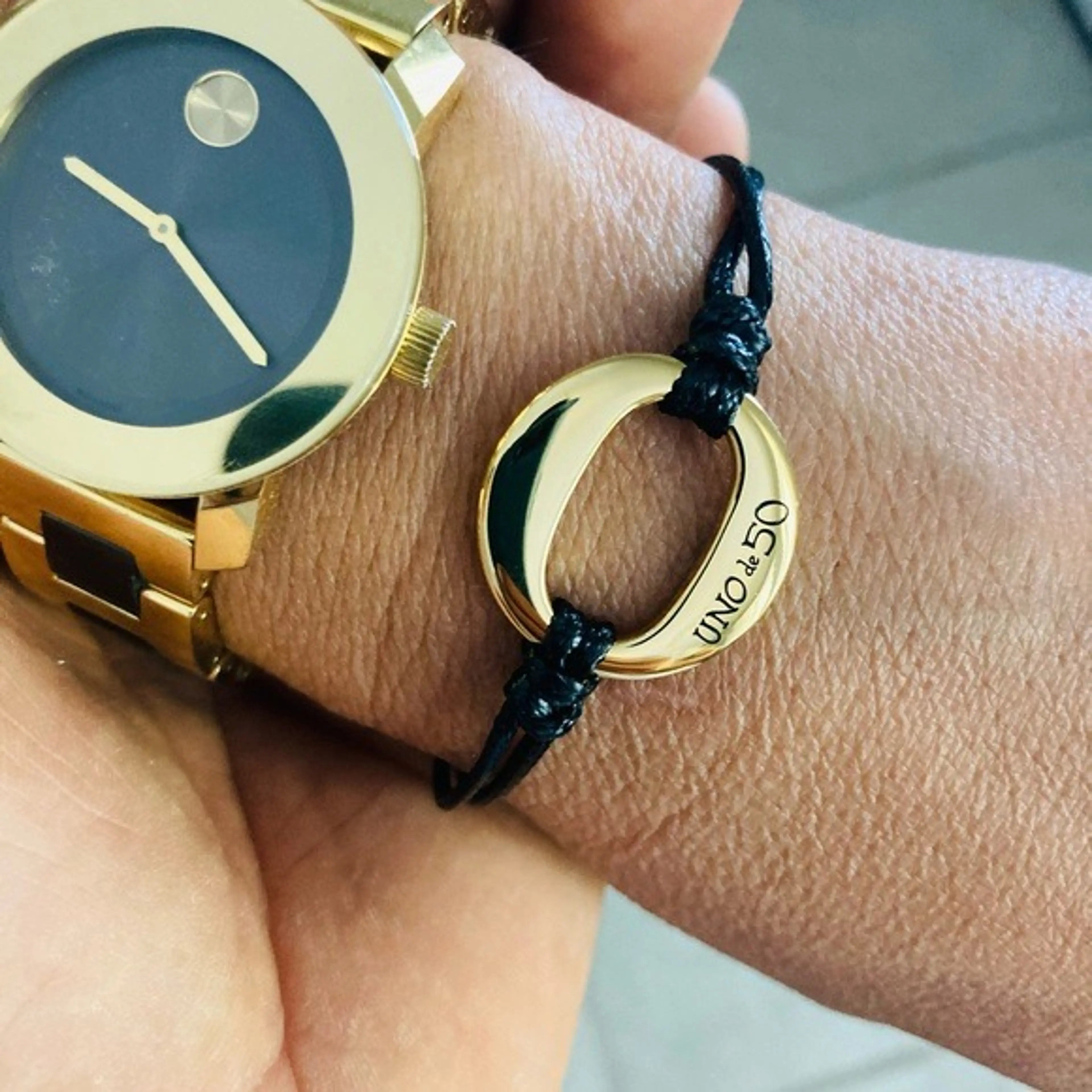  Shop Authentic Movado Bold Black Dial Gold Steel Strap Unisex Watch - 3600397 - Luxxuri