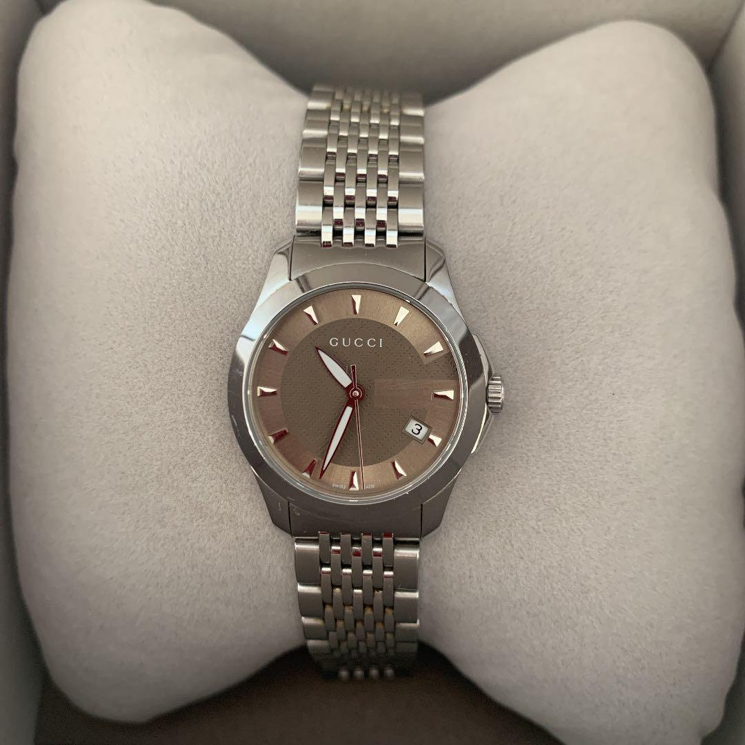  Shop Authentic Gucci G Timeless Brown Dial Silver Steel Strap Watch For Women - YA126503 - Luxxuri