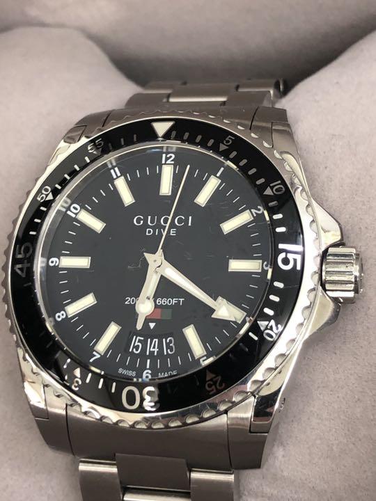  Shop Authentic Gucci Dive Quartz Black Dial Silver Steel Strap Watch For Men - YA136301 - Luxxuri
