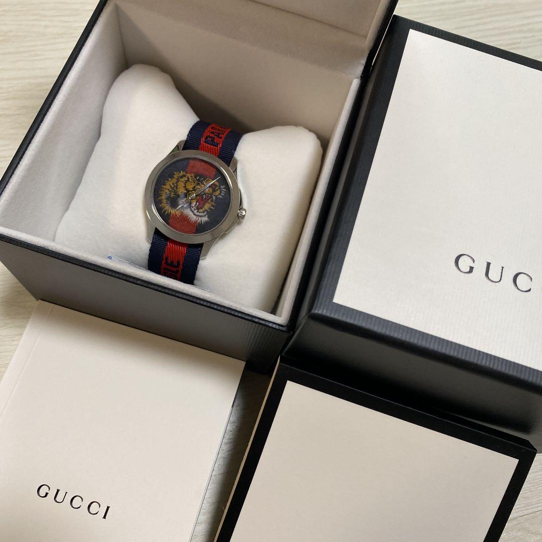  Shop Authentic Gucci G Timless Le Marche Des Merveilles Blue & Red Dial Blue & Red Nylon Strap Unisex Watch  - YA126495 - Luxxuri