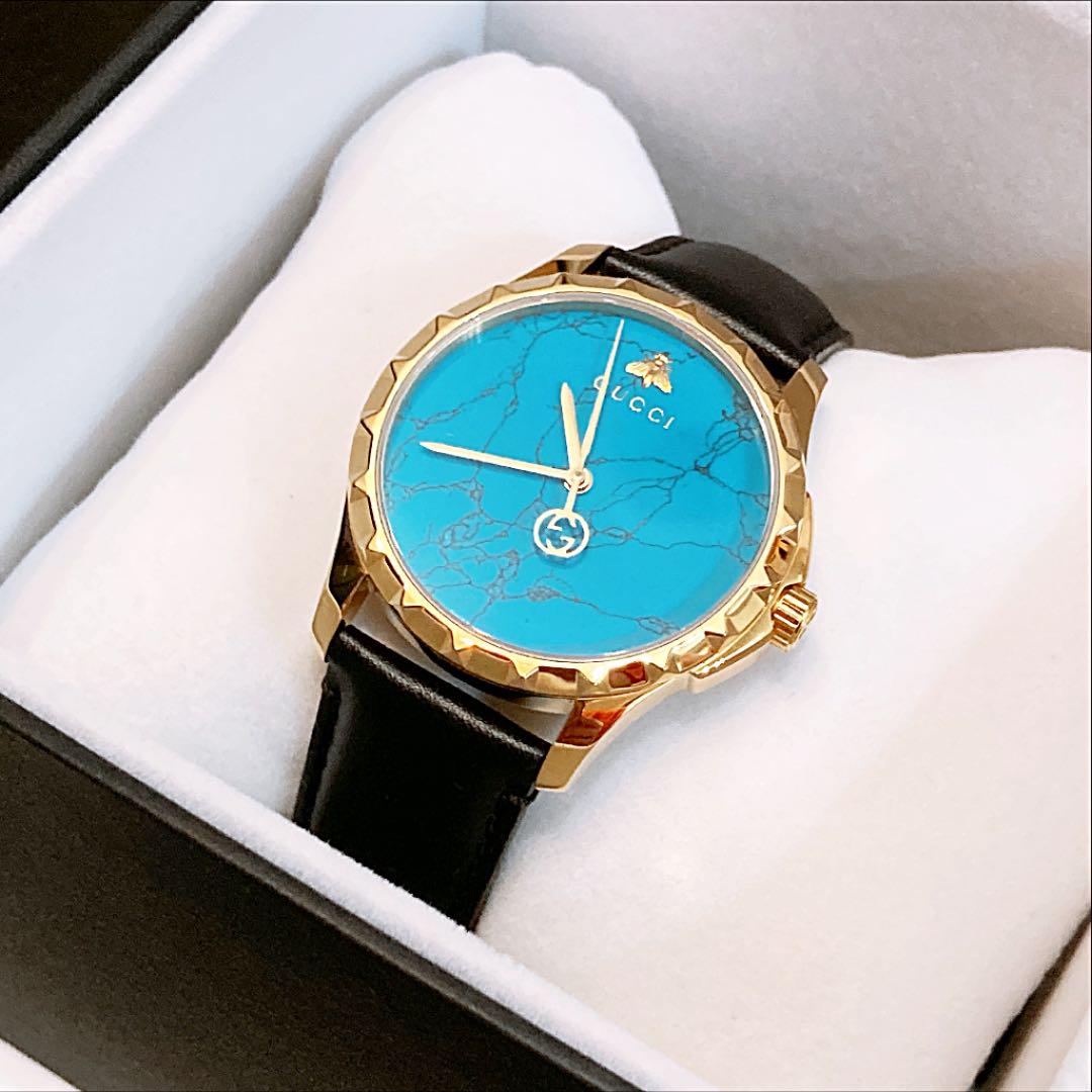  Shop Authentic Gucci G Timeless Turquoise Blue Dial Black Leather Strap Watch For Men - YA126462 - Luxxuri