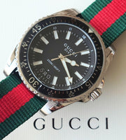  Shop Authentic Gucci Dive Black Dial Two Tone NATO Strap Watch For Men - YA136206 - Luxxuri