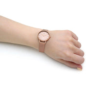  Shop Authentic Daniel Wellington Petite Rose Gold Dial Rose Gold Mesh Bracelet Watch For Women - DW00100471 - Luxxuri