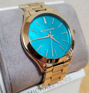  Shop Authentic Michael Kors Slim Runway Blue Mother of Pearl Dial Gold Steel Strap Watch for Women - MK3492 - Luxxuri
