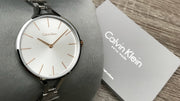 Shop Authentic Calvin Klein Graphic Silver Dial Silver Steel Strap Watch for Women - K7E23B46 - Luxxuri