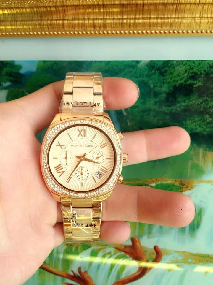  Shop Authentic Michael Kors Byrn Quartz Gold Dial Gold Steel Strap Watch For Women - MK6134 - Luxxuri