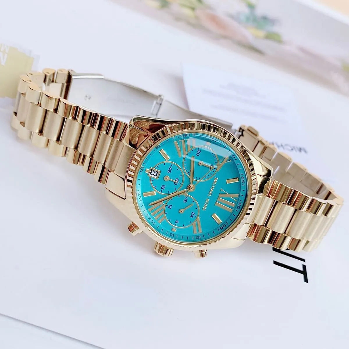  Shop Authentic Michael Kors Lexington Chronograph Blue Dial Gold Steel Strap Watch For Women - MK7216 - Luxxuri