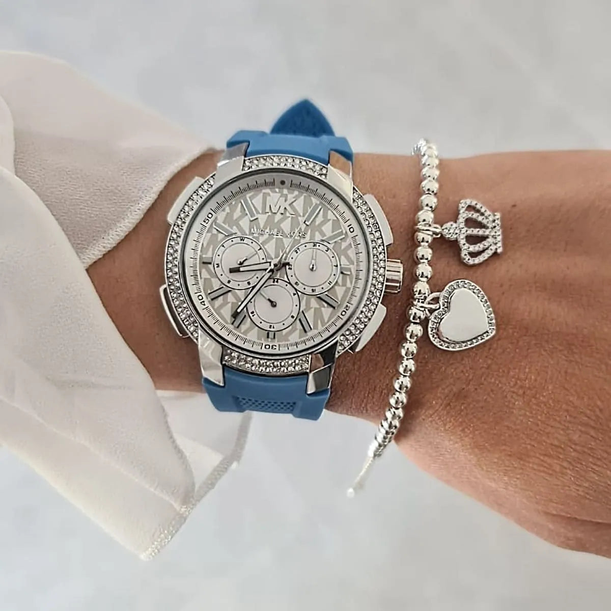  Shop Authentic Michael Kors Sidney Multifunction Crystals Silver Dial Blue Rubber Strap Watch for Women - MK7220 - Luxxuri