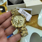  Shop Authentic Michael Kors Bryn Quartz Gold Dial Gold Steel Strap Watch For Women - MK7317 - Luxxuri