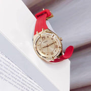  Shop Authentic Guess Cosmo Diamonds Gold Dial Red Rubber Strap Watch for Women - GW0034L6 - Luxxuri