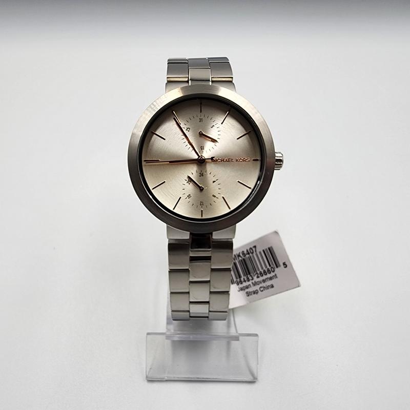  Shop Authentic Michael Kors Garner Analog Silver Dial Silver Steel Strap Watch For Women - MK6407 - Luxxuri