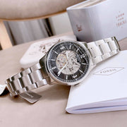  Shop Authentic Fossil Forrester Automatic Skeleton Black Dial Silver Steel Strap Watch for Men - ME3180 - Luxxuri