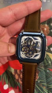  Shop Authentic Fossil Inscription Automatic Skeleton Blue Dial Brown Leather Strap Watch for Men - BQ2571 - Luxxuri