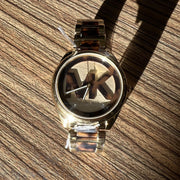  Shop Authentic Michael Kors Janelle Three-Hand Gold Dial Two Tone Steel Strap Watch For Women - MK7136 - Luxxuri