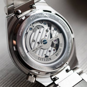  Shop Authentic Citizen Tsuyosa Automatic Titanium Yellow Dial Silver Steel Strap Watch For Men - NK5010-51X - Luxxuri