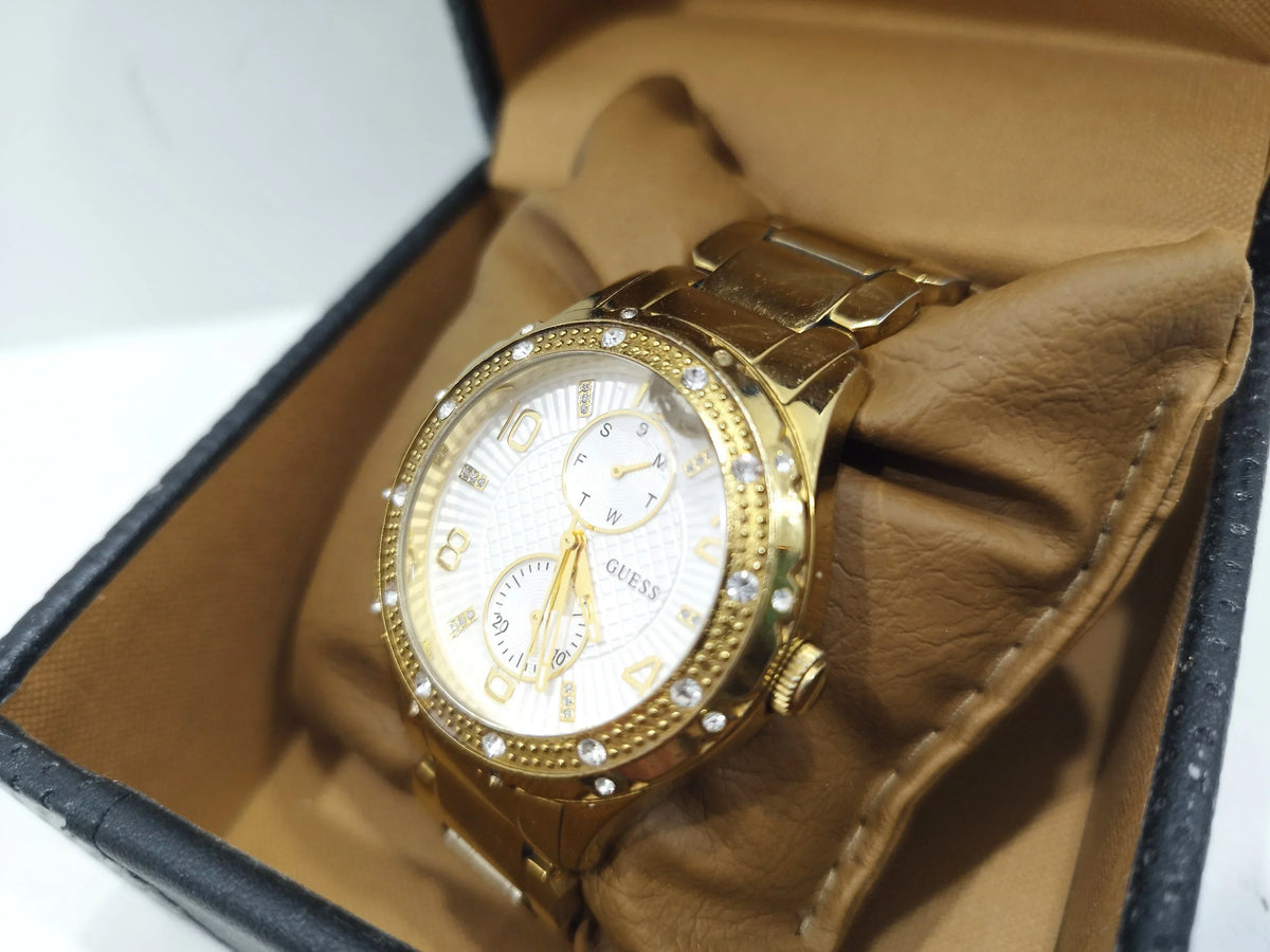  Shop Authentic Guess Siren Diamonds Silver Dial Gold Steel Strap Watch for Women - W0442L2 - Luxxuri